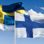 How do international treaties and agreements impact a nation's sovereignty and individual liberties?