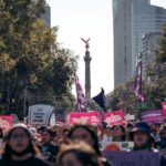 How does the concept of liberty intersect with the rights of refugees and asylum-seekers, particularly in issues of immigration policy and detention?