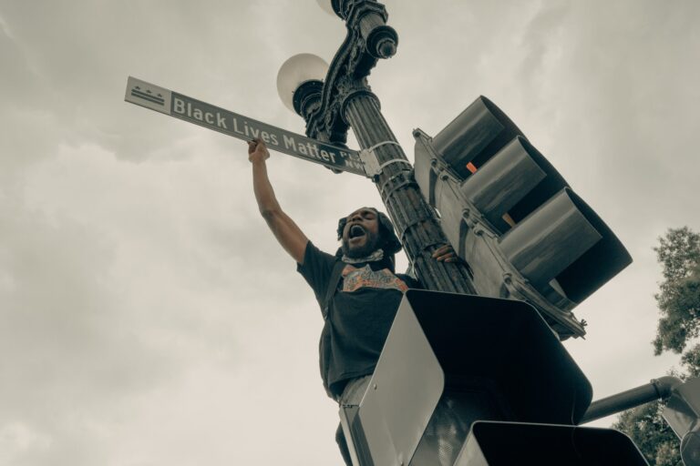Can a society truly value liberty if it practices discrimination based on socioeconomic status or wealth in access to legal representation, political influence, and economic mobility?