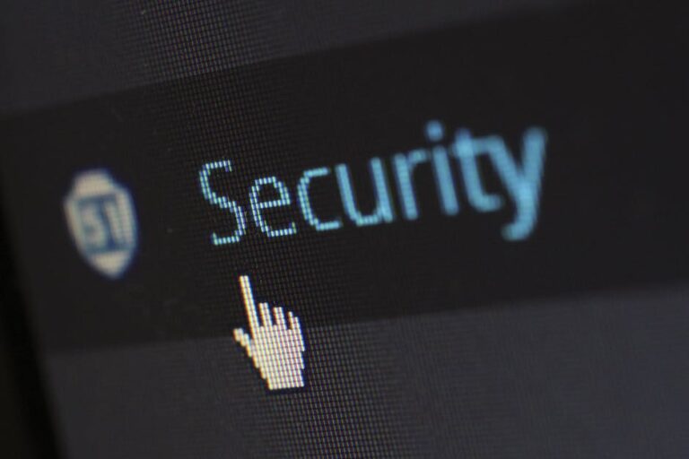 How should a society balance individual liberties with the need for regulations to address cybercrimes and protect cybersecurity?